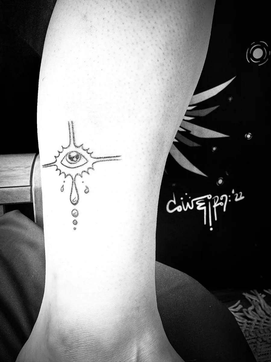 Shining Eye Drip tattoo
